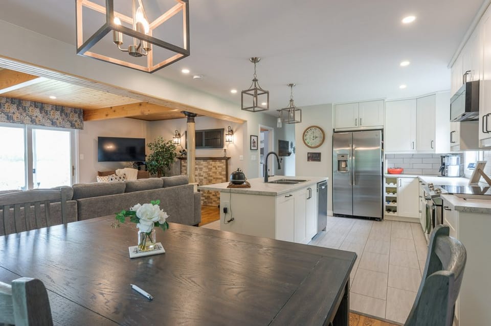 Dining table beside the renovated kitchen