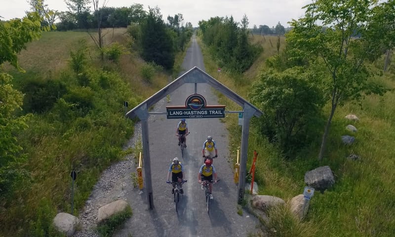 Cyclists at the Lang to Hastings Trail gateway